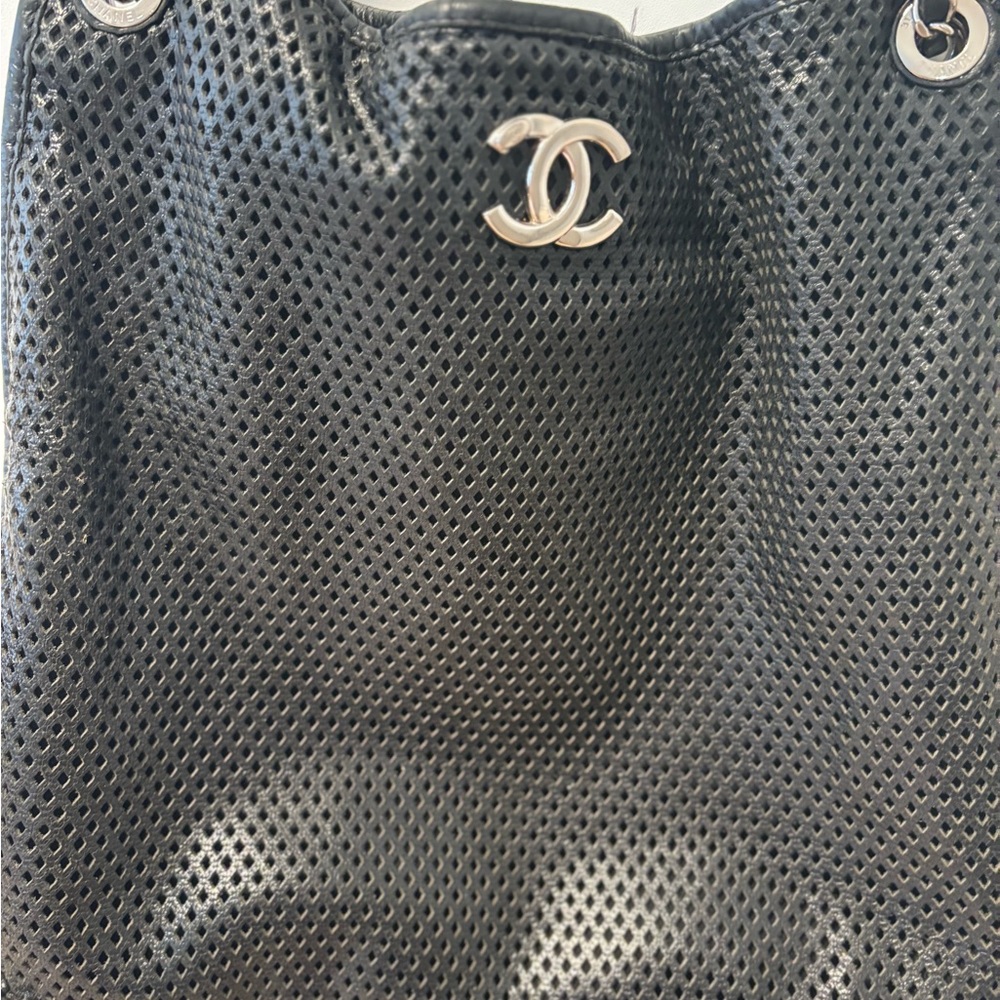 Chanel Black perforated chain handbag